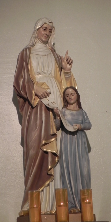 Statue of Sainte Anne teaching her young daughter